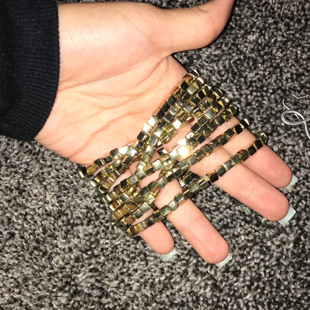 8 piece home made beaded elastic bracelet